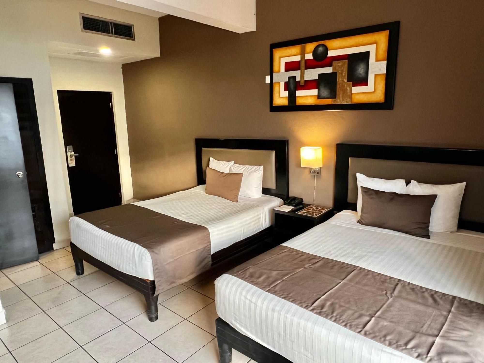 Hotel La Siesta Malecon Mazatlán Quarto foto
